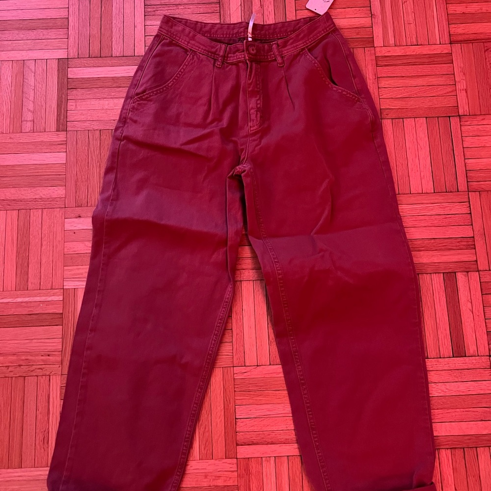 Dark pink FP pants. Tag still on, never worn! Fits like a size 4